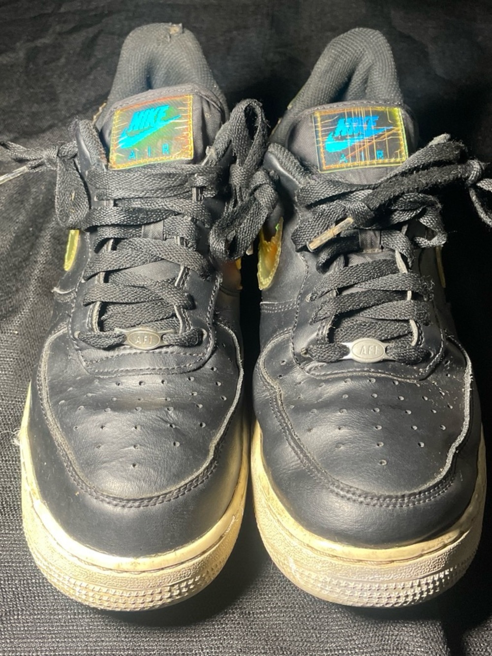 Nike Black Sneakers with Teal Logo and Cream Midsole